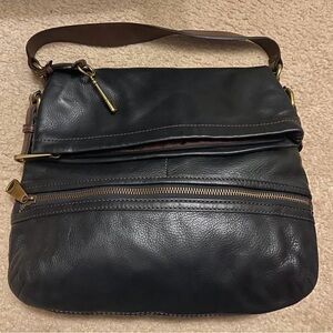 Fossil purse. NWOT. Black leather with brass and key!